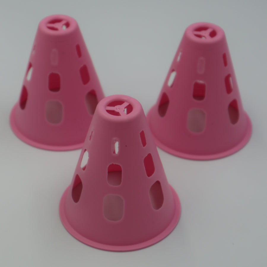 3 RollerFit Slalom skating cones in a baby pink colour in triangle formation.