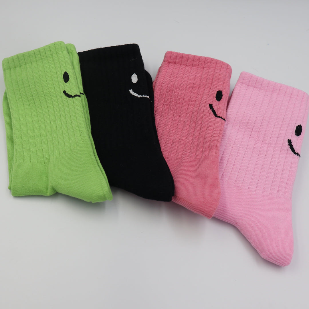 RollerFit ribbed crew socks with a smiley face eyes and mouth design above the heel: 4 colourways
