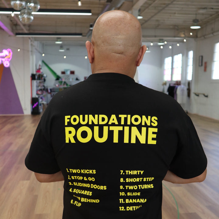 T-Roll wearing the RollerFit x T-Roll anniversary black and yellow oversized t-shirt at RollerMart in Sydney