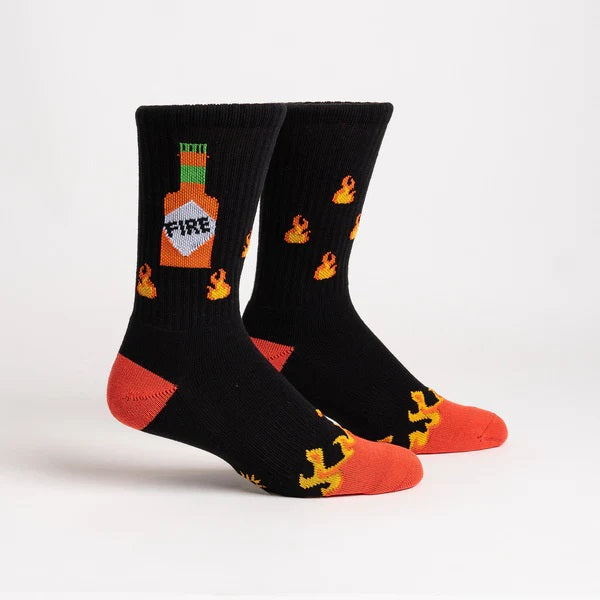 Black ribbed socks with orange, red and yellow flames and a hot sauce bottle with text "fire"