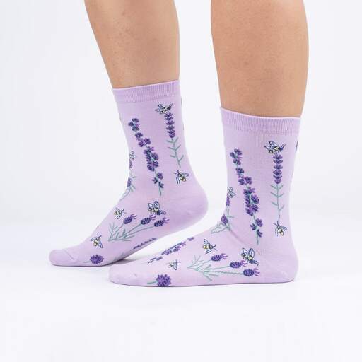 Lilac socks with lavender flower stems and yellow bees.