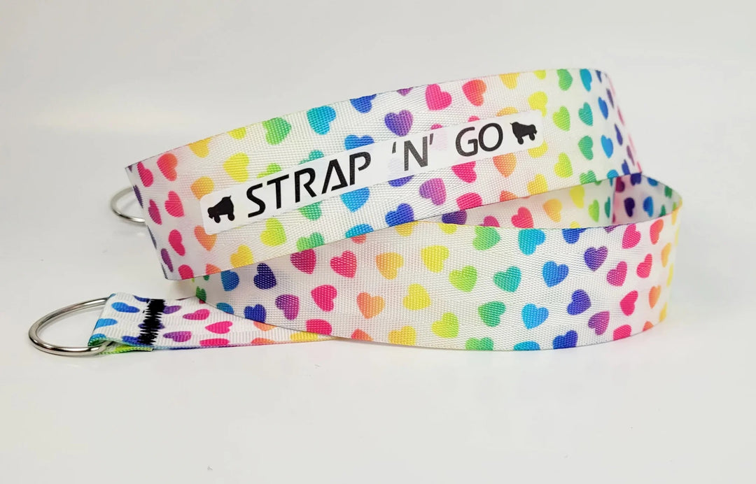 Strap N Go skate leash in Rainbow Hearts: white background with bright rainbow gradient across small heart pattern.