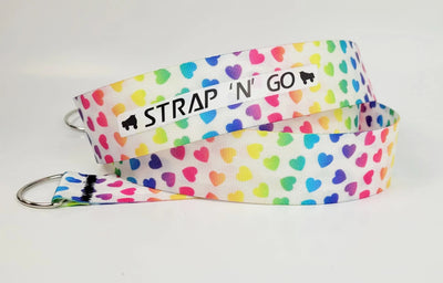 Strap N Go skate leash in Rainbow Hearts: white background with bright rainbow gradient across small heart pattern.