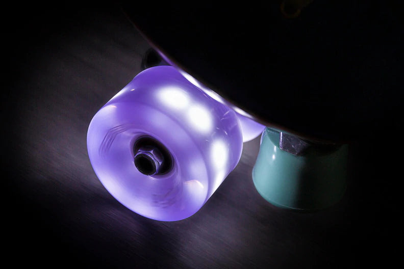 Chaya Neons Light Up Wheels in Purple lit up.