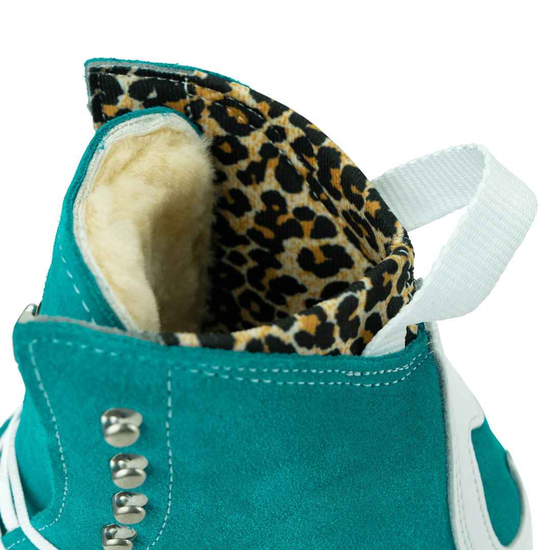 Moxi Roller Skates Jack 1 boots in Jade with tan sole, white backstay and laces, leopard print lining.