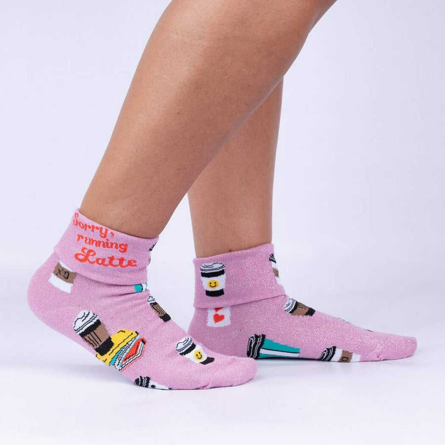 Shimmery pink turn cuff crew socks with coffee cups.