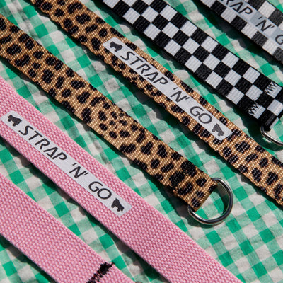 3 strap n go designs on a green and white gingham background.