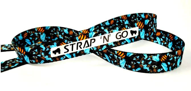 Strap N Go skate leash in bee print with black, teal and yellow.