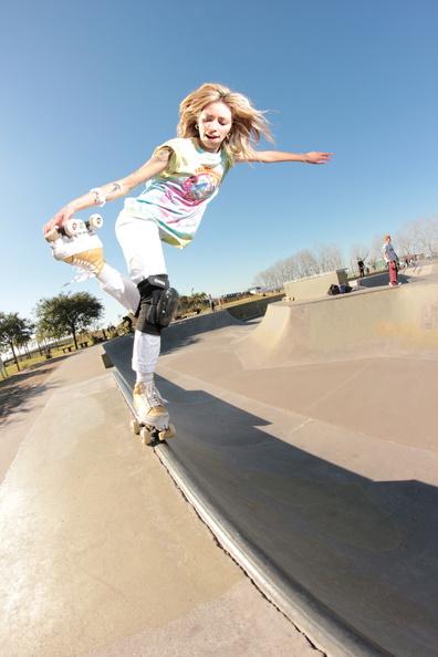 Barbie Luciana does a makio stall with a marilyn grab in a mini ramp whilst wearing her Kismet gold and white roller skates.