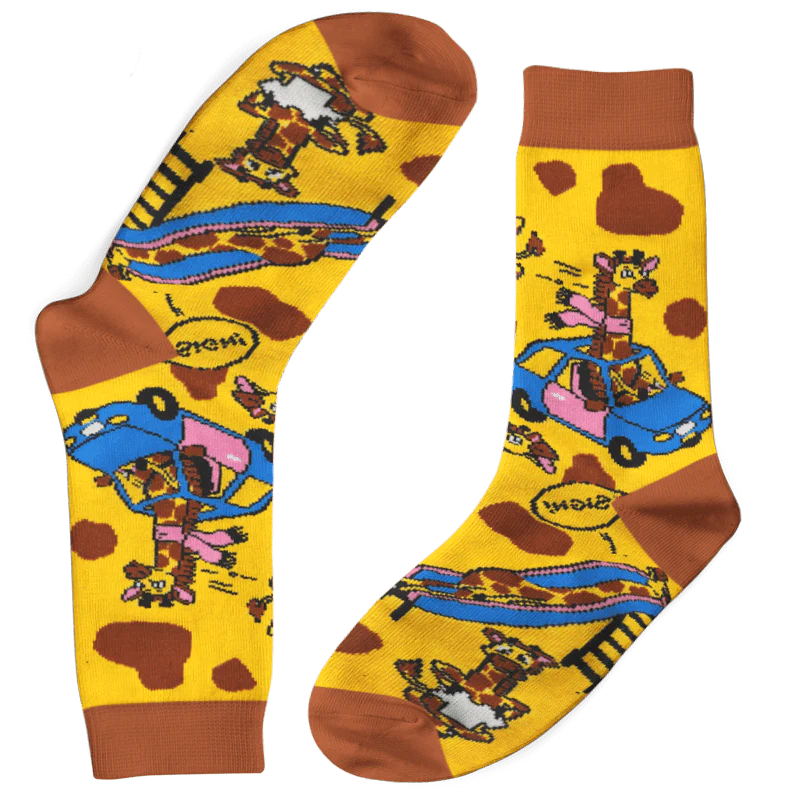 Socks with Giraffes in cars and on slides with yellow background.