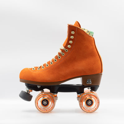 Side view Moxi Roller Skates Lolly roller skates in Clementine orange.