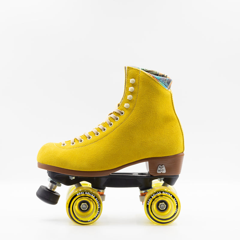 Moxi Roller Skates Lolly roller skates in Pineapple yellow with oyster laces and eyelets, tan sole, black plate and toe stop, matching yellow wheels.