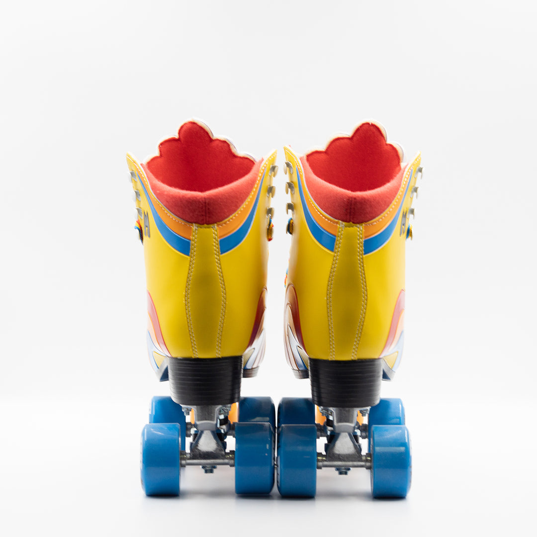 Moxi Roller Skates Rainbow Rider in Sunshine Yellow with white tongue, blue wheels and orange toe stop.