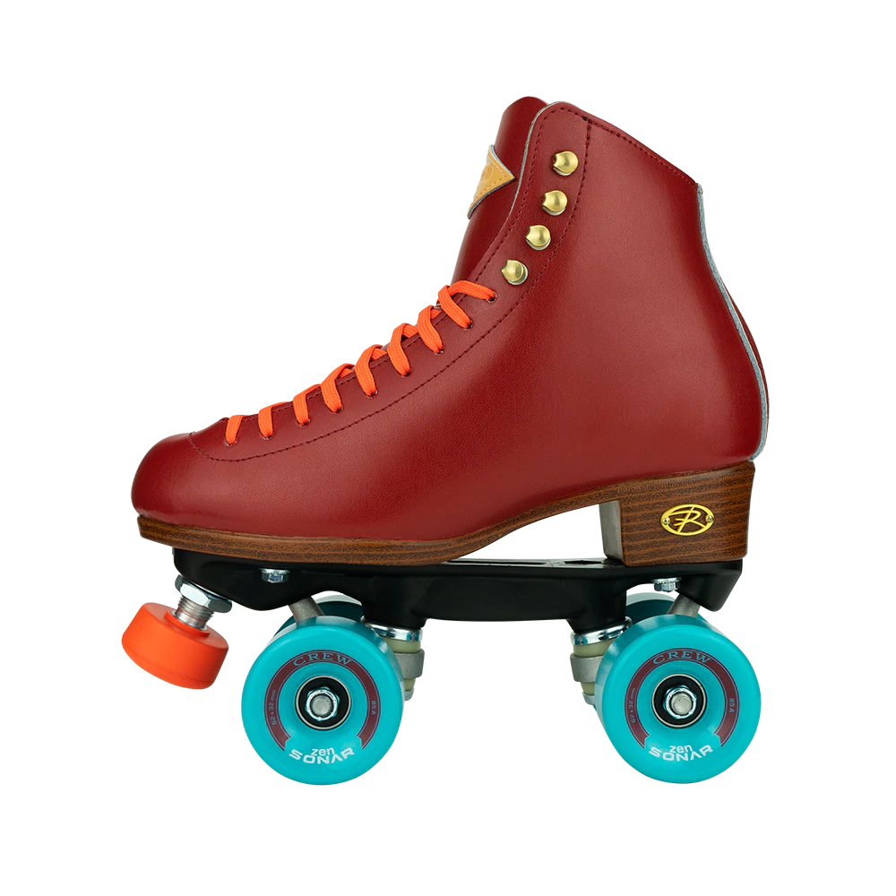 Riedell Crew roller skates in Crimson red with orange laces and toe stops, and blue wheels.