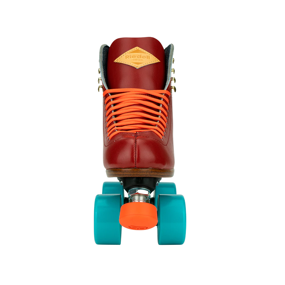 Riedell Crew roller skates in Crimson red with orange laces and toe stops, and blue wheels.