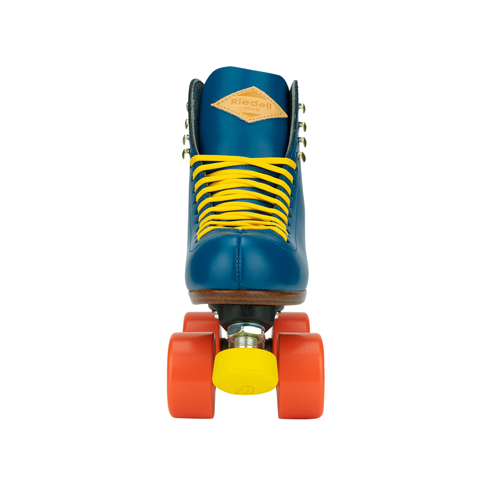 Riedell Crew roller skates in Ocean blue with yellow laces and toe stops, and orange wheels.