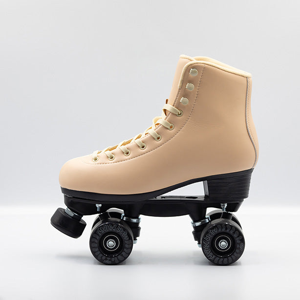 Chuffed Skates Cruiser roller skates in Sunrise, a cream and apricot 2 tone boots with all black hardware.