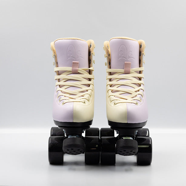 Chuffed Skates Cruiser roller skates in Sunset, a cream and lilac 2 tone boots with all black hardware.