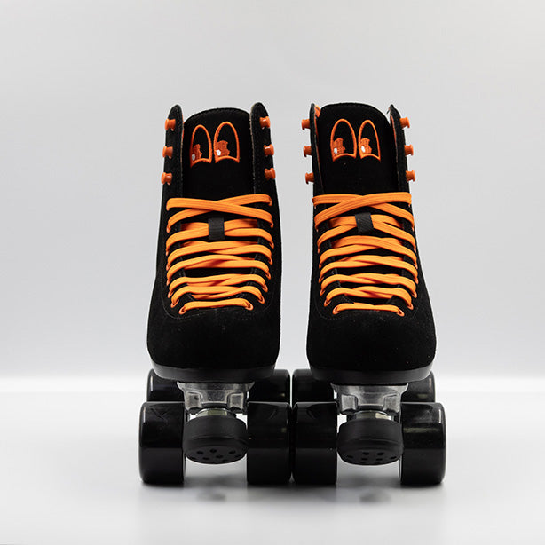 Chuffed Skates Fuegote roller skates with black suede boots, toe stops, wheels and orange laces, eyelets, logo embroidery and a piping hot flame lining.