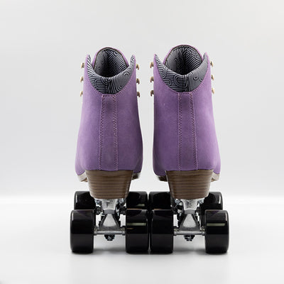Chuffed Skates Wanderer roller skates in Jacaranda Purple with cream laces, eyelets and logo embroidery on the tongue, black wheels and toe stops.
