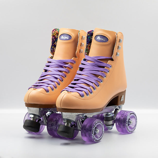 Moxi Roller Skates Beach Bunny skates in Peach with lilac laces and wheels.