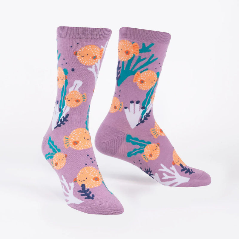Lilac socks with cute cartoon orange pufferfish and white, teal and navy coral.