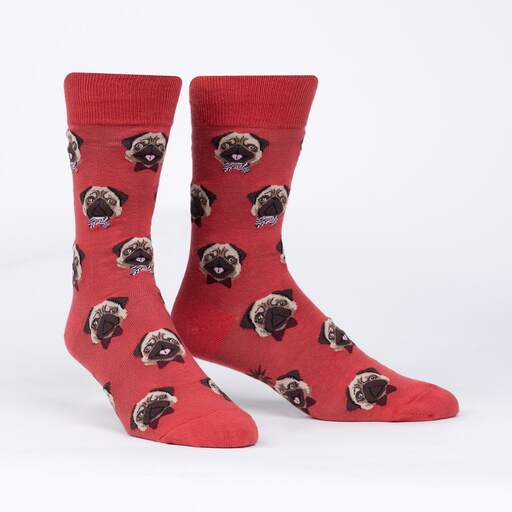 Red/orange socks with pug faces wearing bow ties.