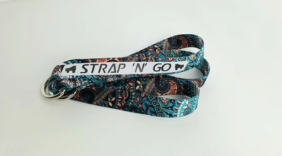 Strap N Go skate leash in boho print with teal, apricot, black and white paisley print..