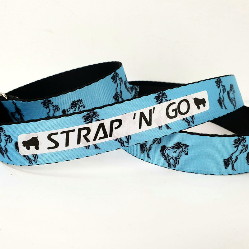 Strap N Go skate leash in blue and black horse print.