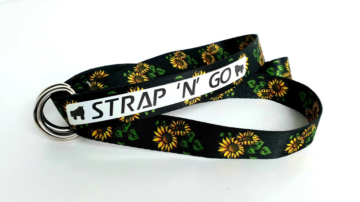 Strap N Go skate leash in black with yellow sunflowers print.