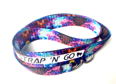 Strap N Go skate leash in universe print with blue, pink and orange galaxy print.