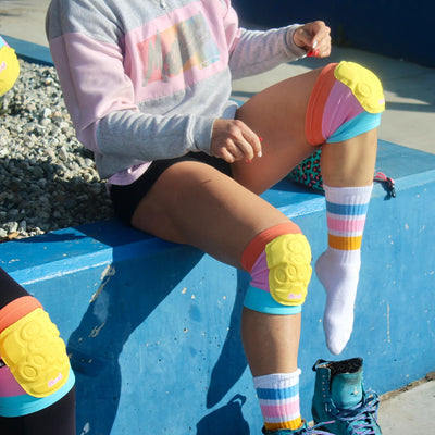 Estro wears the Triple 8 x Moxi Roller Skates Covert Knee pads.